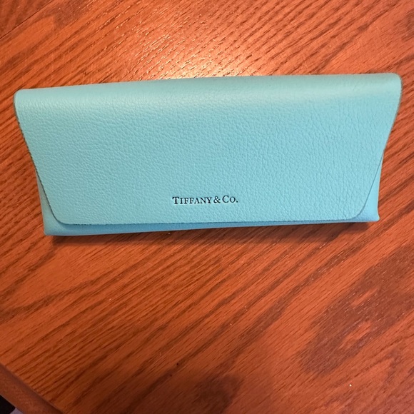 Tiffany & Co. Accessories - Tiffany & Co. Blue Leather Women's Clutch
